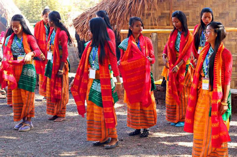 Naga performers preparing before a dance